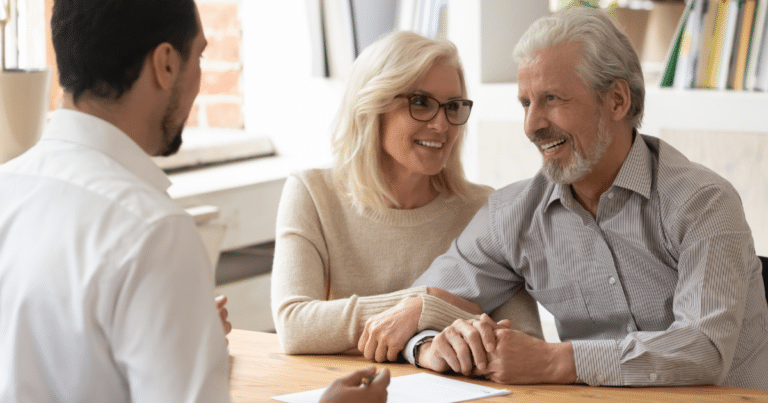 Senior Couple Speaking with a Sales Representative