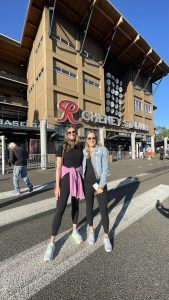 Ellyce and Rachel standing in front of Cheney Stadium 