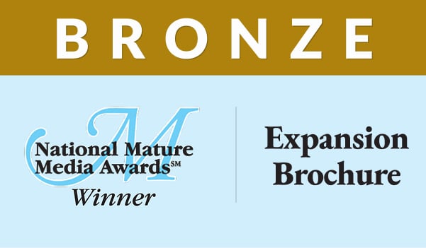 Bronze award banner for the National Mature Media Awards, Expansion Brochure.